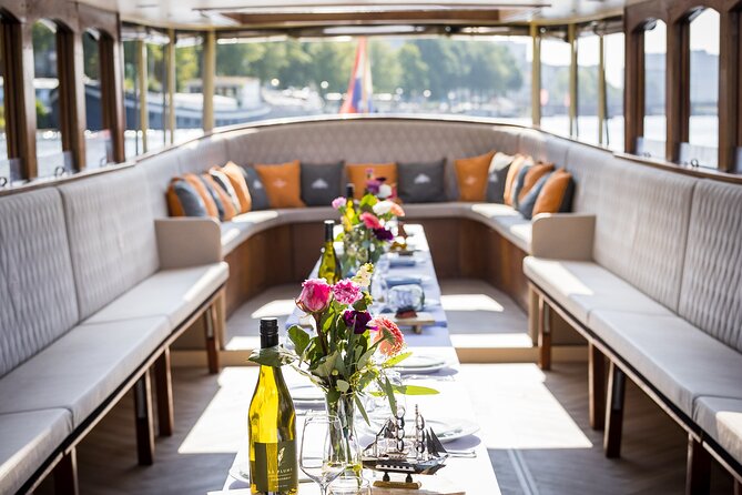Amsterdam Historic Tour On Classic Saloon Boat - Key takeaways before you board