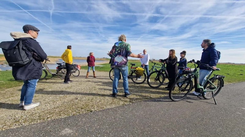 Amsterdam: Leisurely Windmill & Countryside Bike Ride - The Admiral windmill and canal riding north of the city