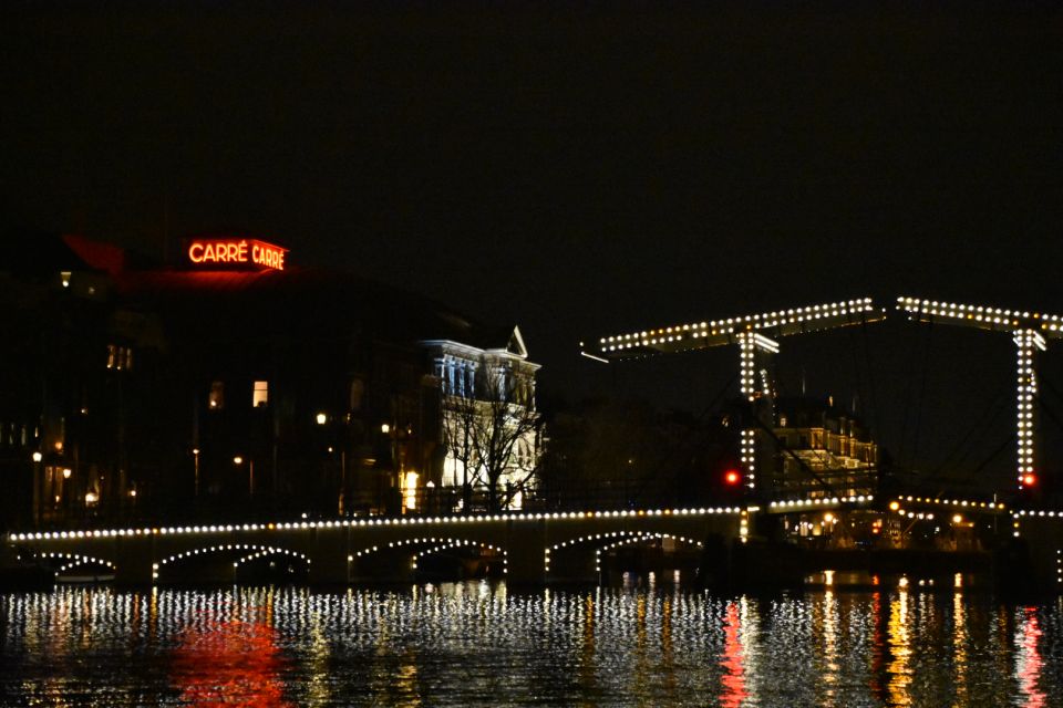Amsterdam: Light Festival Heated Cruise with Drinks & Snacks - What the guide adds: stories, pace, and even music