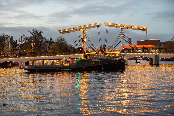 Amsterdam: Light Festival Open Boat - Unl. Drinks Option - The night-canal route: Pierre Cuypers to the draw bridge