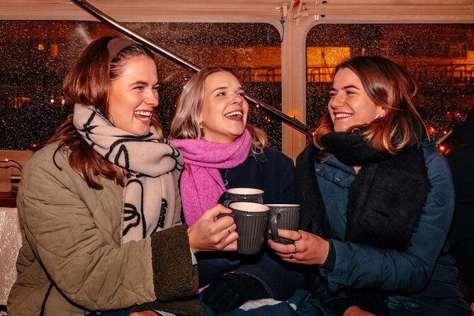Amsterdam: Light Festival Shared Boat with unlimited drinks - Onboard vibe: the host, the captain, and the small-group feel