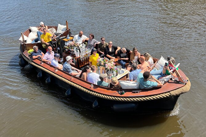 Amsterdam Luxury Boutique Boat tour with Unlimited Beer and Wine - Open bar reality: unlimited beer and wine, but know the limits