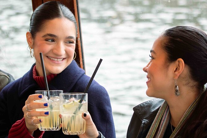 Amsterdam: Luxury Saloon Boat Cruise with Cocktails & Waffle - Locks, steam gates, and the engineering that keeps canals alive
