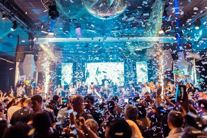 Amsterdam Nightlife Ticket & Bottle of Champagne - Champagne and welcome drinks: how to use the perks without rushing