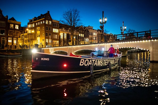 Amsterdam Open Boat Cruise in Old City Center with Live Guide - Included Drinks: Small Perk, Big Comfort