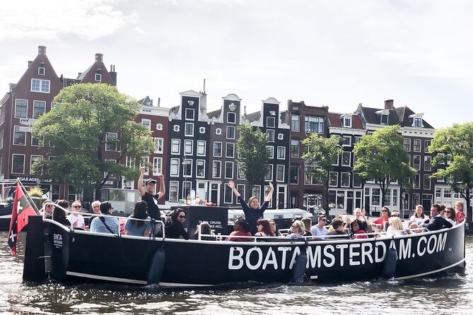 Amsterdam Open Boat Cruise in Old City Centre with Drinks Options - Getting set for departure: Amstel 51F and the Hermitage dock area