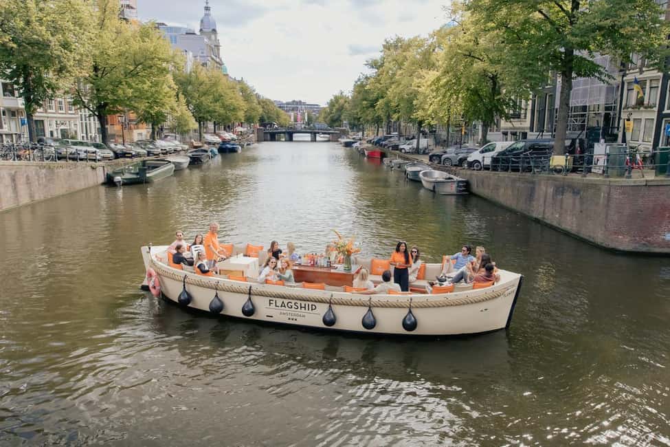 Amsterdam: Open Boat Cruise option Unlimited Drinks & Bite - The guides and crew: where the cruise turns fun