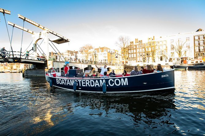 Amsterdam Open Boat Cruise with Live Guide and Two Drinks - Group size and vibe: small boat feels more personal