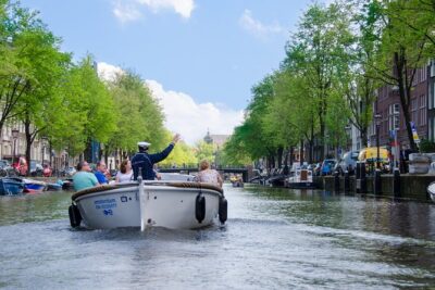 Amsterdam Open Boat Sightseeing Canal Cruise - Westerkerk and the UNESCO Canal Ring: your first canal “aha”