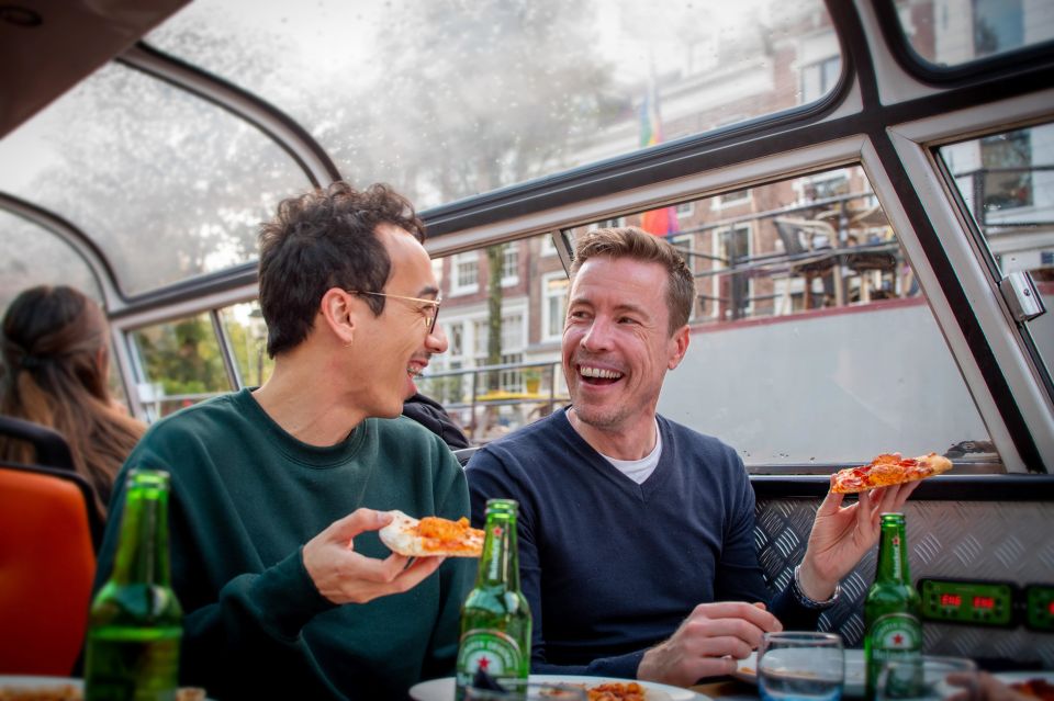 Amsterdam: Pizza Cruise with New York Pizza & Drinks - Covered Boat Comfort: A Good “First Amsterdam Night” Option