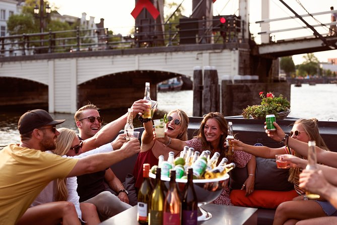 Amsterdam Private BBQ and Drinks Cruise With Onboard Chef - Hermitage branch, Amstel bridge, and the floating flower market