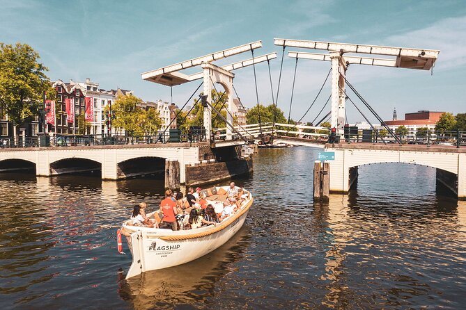 Amsterdam Private Boat Tour with Unlimited Drinks - A private 90-minute canal cruise that starts near Central Station