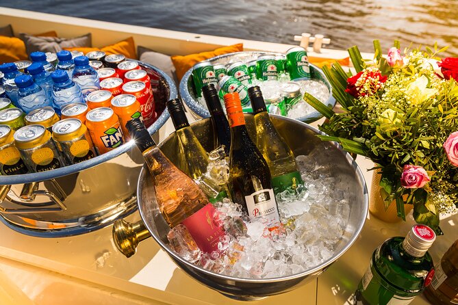Amsterdam Private Boat Trip with Pizza and Unlimited Drinks - Private Canal Views, Pizza, and Unlimited Drinks