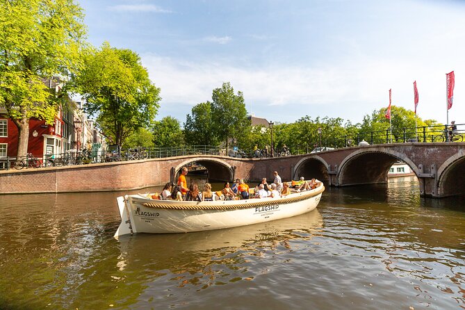 Amsterdam Private Boat Trip with Pizza and Unlimited Drinks - The Guide and Skipper: The Difference Between a Ride and a Story