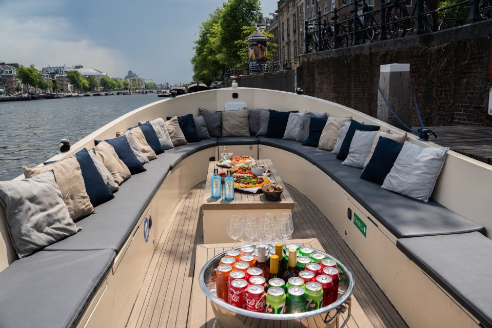 Amsterdam: Private Canal Booze Cruise with Unlimited Drinks - Getting on board at Amstel 178 (and why the meeting matters)