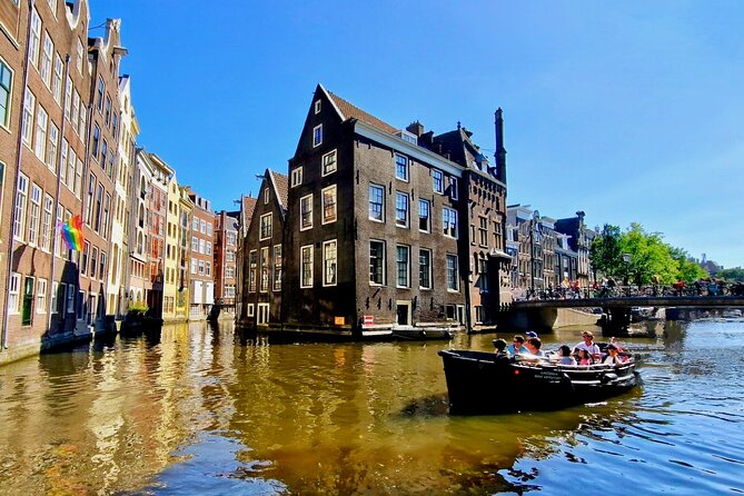 Amsterdam Private Canal Cruise – 90 Minutes through the Old City - Waterlooplein energy, then a calmer pocket of houseboats