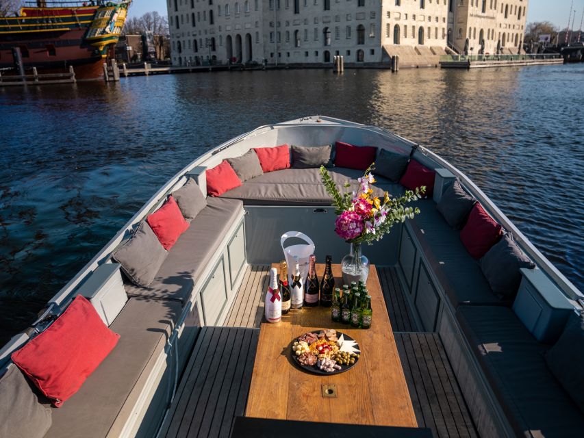 Amsterdam: Private Canal Cruise with Drinks and Snacks - The 1.5-hour canal route: the sights you’ll see from the water
