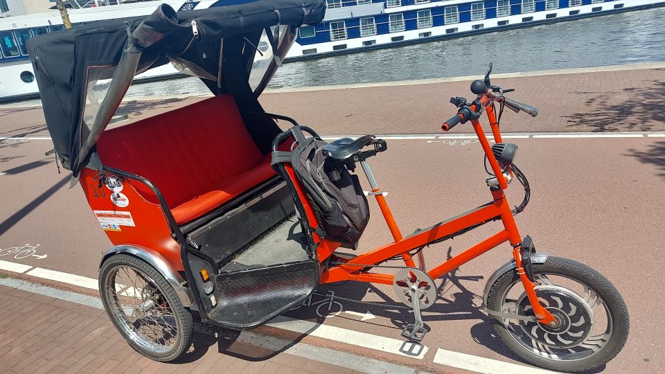 Amsterdam: Private City Highlights Tour by Rickshaw - Dam Square and the early history story you can feel