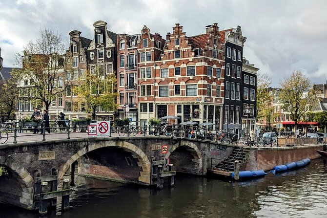 Amsterdam private city walking experience with a local - House on the Three Canals: A Clever Canal-Side Story