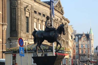 Amsterdam: Private Hidden Gems Discovery Tour - Dam Square, Nieuwe Kerk, and the power buildings that shaped town