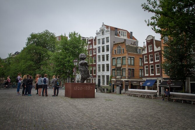 Amsterdam Private Historical Walking Tour - Bloemenmarkt: the floating flower market you can’t fake