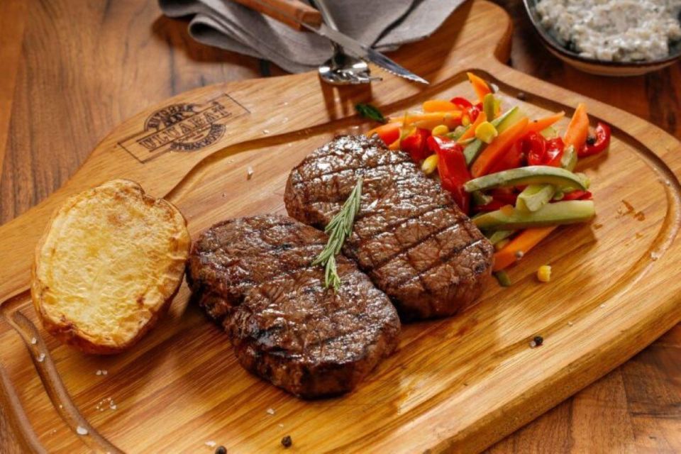 Amsterdam: Private Luxury Cruise with BBQ and Drinks - The canal route: Red Light District, Amstel River, and the 7 Bridges view