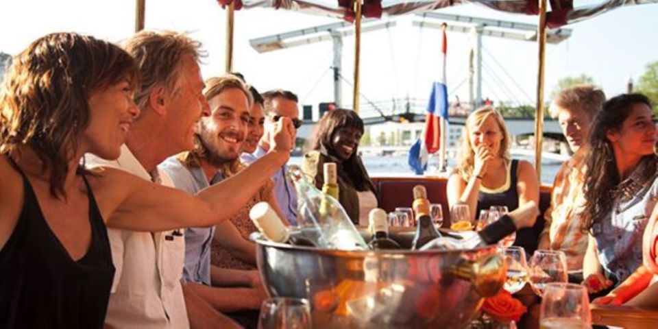 Amsterdam: Private Luxury Cruise with Pizza and Drinks - Pizza and unlimited wine, beer, and soft drinks: real value, with a couple cautions