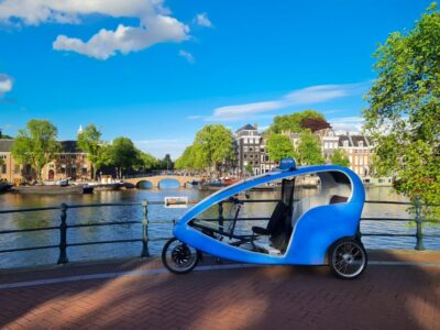Amsterdam: Private Pedicab Historical Sightseeing Tour - Nieuwmarkt and the city gate: history right in the middle of the street