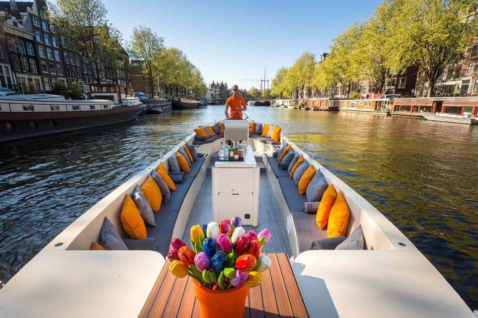 Amsterdam: Private Prosecco Canal Cruise Tour - How the skipper and live guide make it feel worth $280