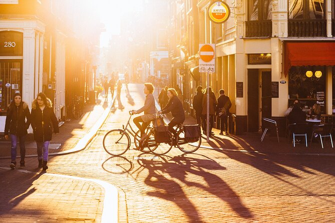 Amsterdam Private Tour: Highlights & Hidden Gems by Bike or Foot - Dam Square to Rembrandtplein: Royal Power Meets Everyday Life