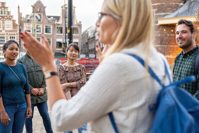 Amsterdam Red Light District Walking Tour in EN/DE/IT/ES - Dam to the first rules: respect, safety, and no-photo boundaries