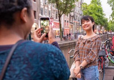 Amsterdam: Red Light Tour Exclusive + Peep Show - Starting at Dam Square: the quick orientation that saves your time