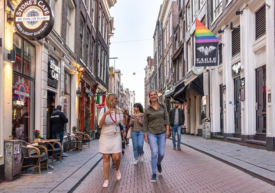 Amsterdam: Red Light Tour Exclusive + Peep Show - Dancing Houses and Borstplaat in brons: architecture and memory in the same walk