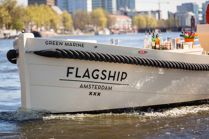 Amsterdam: Saloon Boat Cruise + Unlimited Drinks & Bite option - Those canal angles: Drunken Houses and the rare multi-bridge view