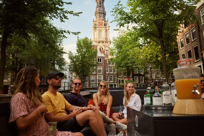 Amsterdam: Saloon Boat Cruise + Unlimited Drinks & Bite option - The guide and skipper combo: why the vibe is so often the highlight