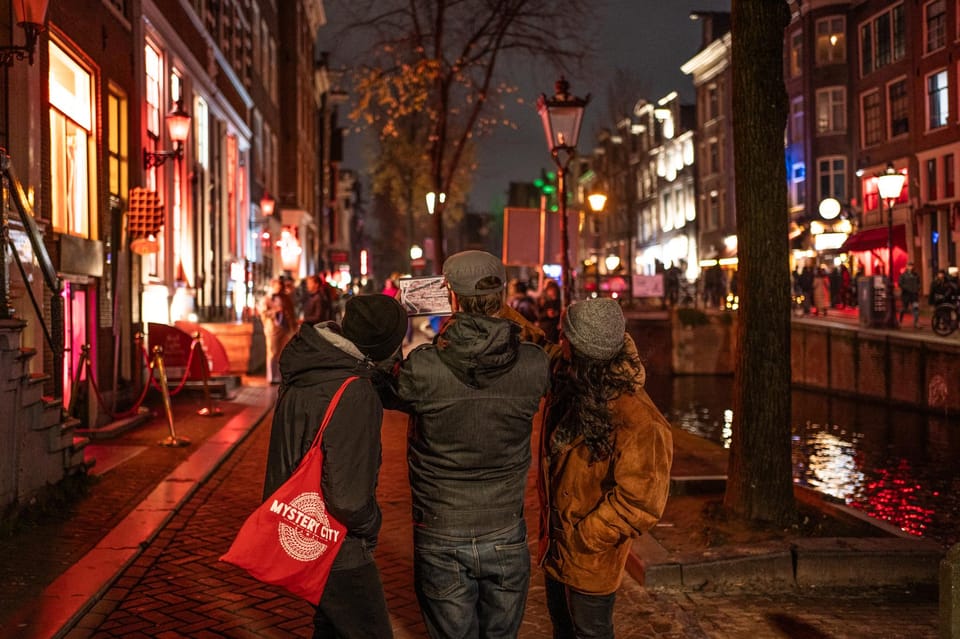 Amsterdam: Self-guided Red Light District Pub Crawl Mystery - The De Prael finale near Central Station: your last drink and the case wrap