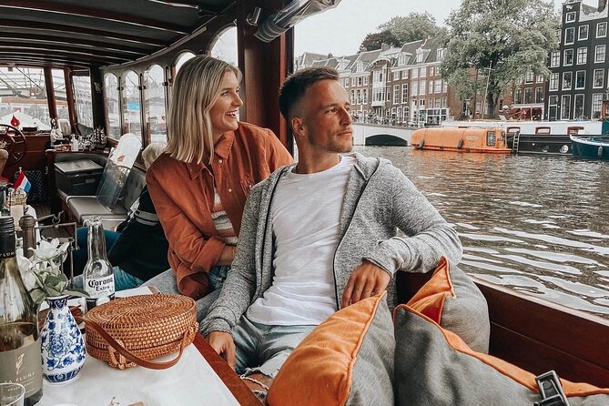 Amsterdam Small-Group Bike Tour With Canal Cruise, Drinks, Cheese - Starting point: Nieuwezijds Voorburgwal and the “wake up your legs” plan