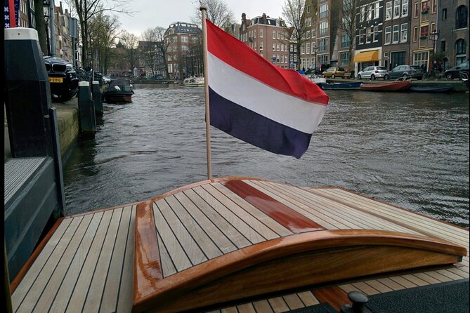 Amsterdam small-group canal cruise in 1920s saloon boat - Prinsengracht, Herengracht, Keizersgracht, Reguliersgracht: the canal ring, one name at a time