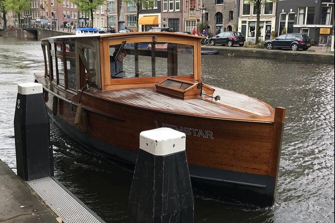 Amsterdam small-group canal cruise in 1920s saloon boat - Magere Brug: the classic bridge moment for photos (and calm cruising)