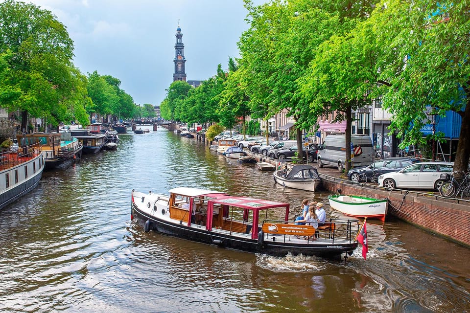 Amsterdam: Small-Group Canal Cruise incl. Drinks and Snacks - The Giuliana boat: old-world charm, modern electric comfort