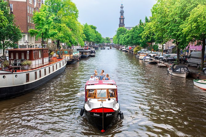Amsterdam Small-Group Canal Cruise With Dutch Snacks and Drink - NEMO, maritime history, and the zoo: quick stops that broaden your city brain