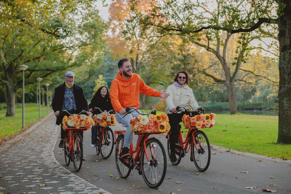 Amsterdam: Top Highlights Guided Bike Tour EN/DE/ES/FR/IT/CN - Bikes, Safety, and the Meet-Up Near Central Station