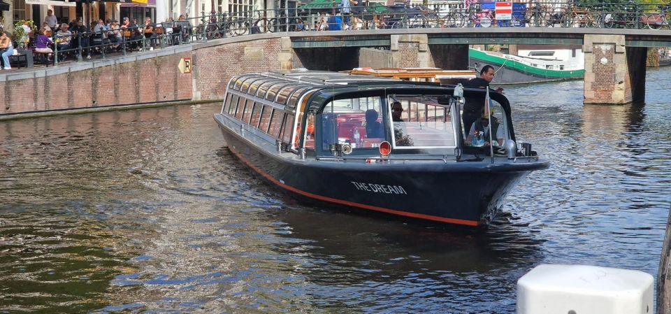 Amsterdam: Traditional Canal Cruise with Bar on Board - A cozy, covered canal cruise that doesn’t freeze you out