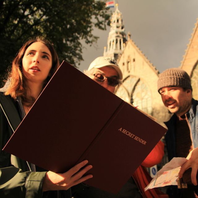 Amsterdam: Treasure Hunt Walking Tour "A Secret Sender" - Oude Kerk: where the story part becomes part of the game