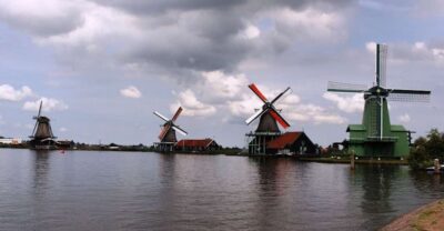 Amsterdam: Volendam, Windmill, and Cheese Farm Private Tour - Zaanse Schans: windmills, wooden houses, and real jobs