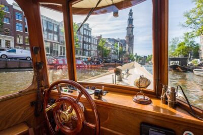 Amsterdam Walking Tour and Cruise with Drinks and Cheese Tasting - Meeting at Beursplein: Finding the Guide and Starting With a Real Anchor