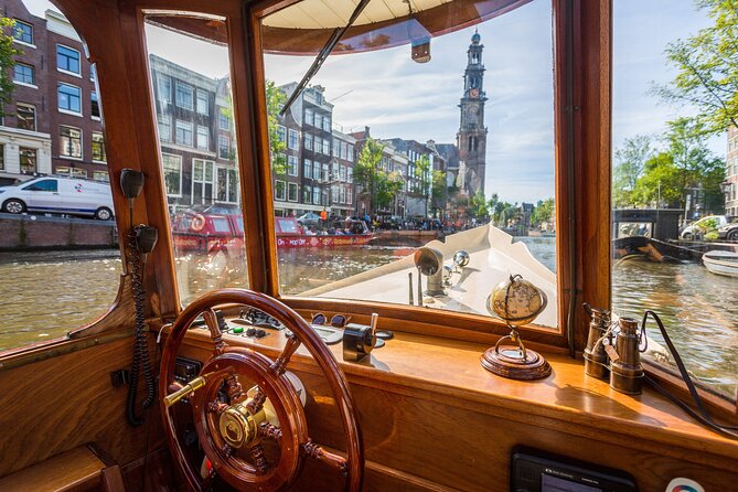 Amsterdam Walking Tour and Cruise with Drinks and Cheese Tasting - Meeting at Beursplein: Finding the Guide and Starting With a Real Anchor