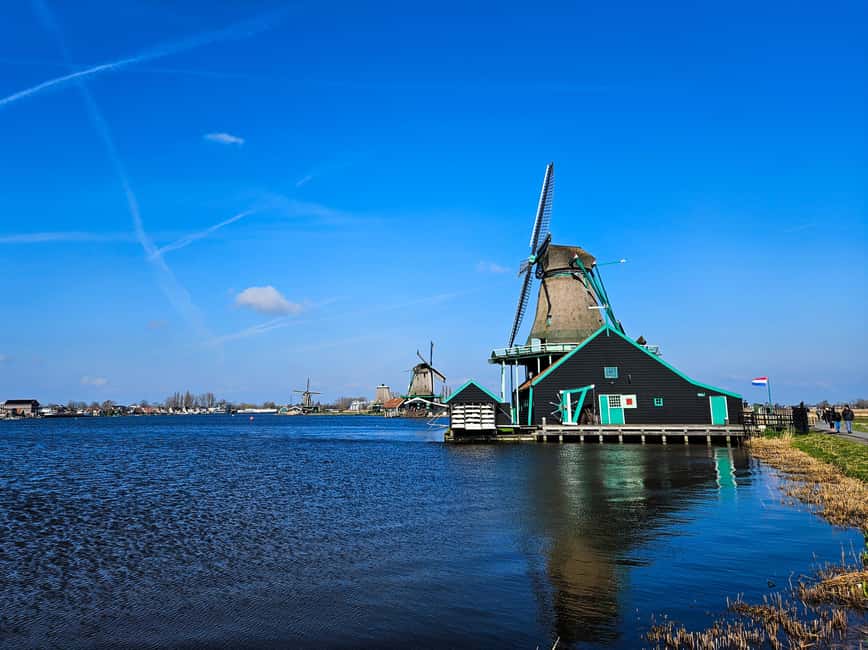 Amsterdam: Zaanse Schans windmills & Volendam Guided Tour - Key highlights that make this day trip worth your time