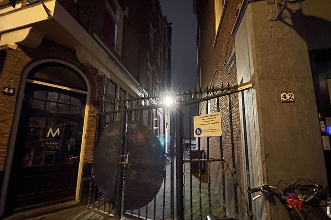 Amsterdam’s Ghostly Experiences Group Tour - Walking Along the Red Light District: What You Can Expect