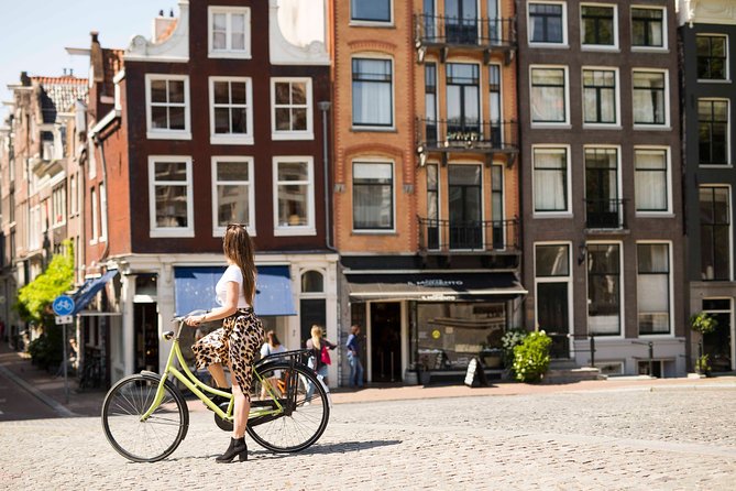 Anne Frank Private Bike Tour in Amsterdam - Meeting at Flagship Bike Tours and finding the orange umbrella
